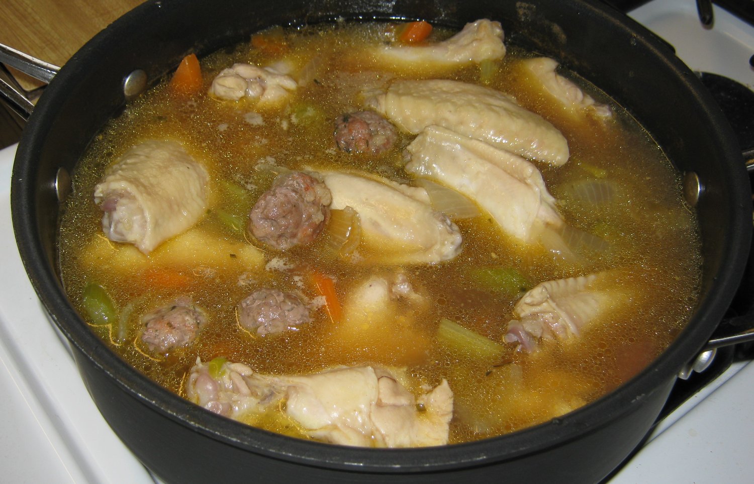 Chicken fricassee with tiny meatballs.